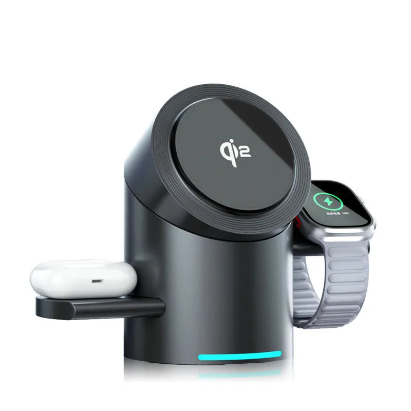 Three-in-one magnetic wireless charger stand in dark grey charging a phone, earphones, and Apple Watch