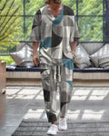 Man's thin polyester tracksuit set with V-neck cropped sleeve jacket and matching trousers