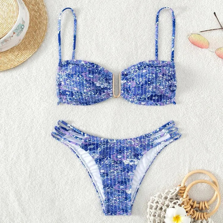 Women's orange high-waisted floral bikini swimsuit with matching bra
