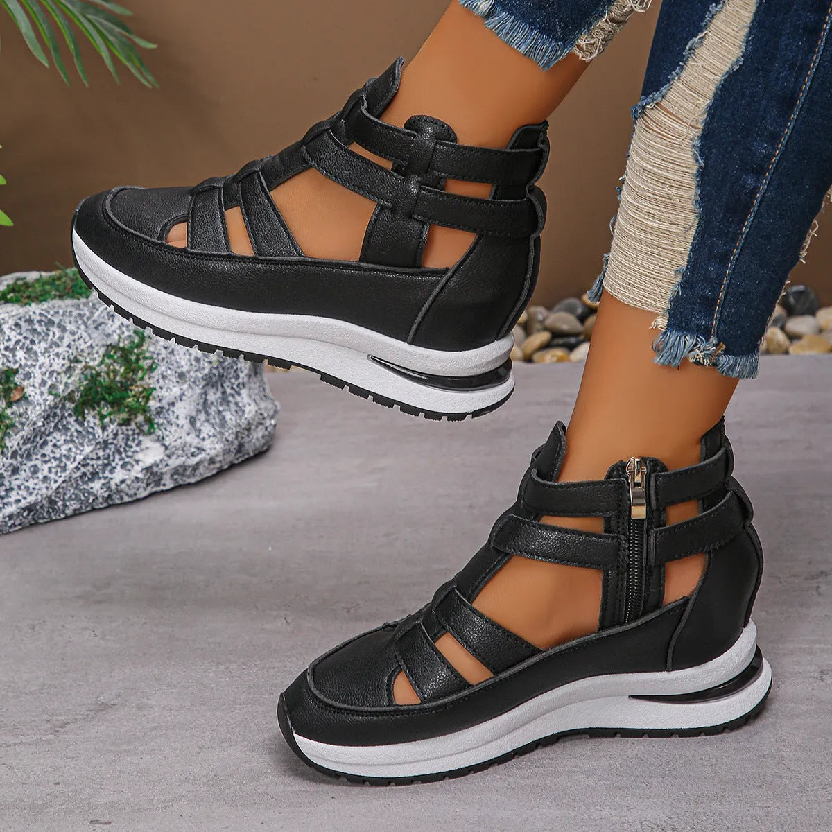 Women's black close-toed hollow-out platform sandals with Velcro fastening showing round toe design