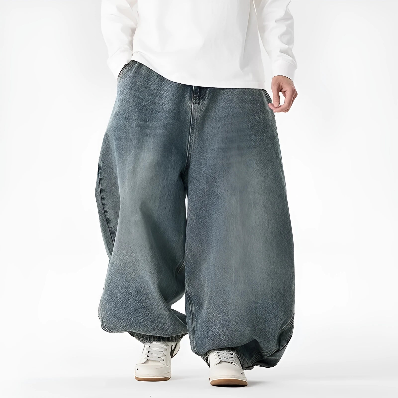 Men's plus size baggy jeans in dark blue denim with a straight leg and low waist.