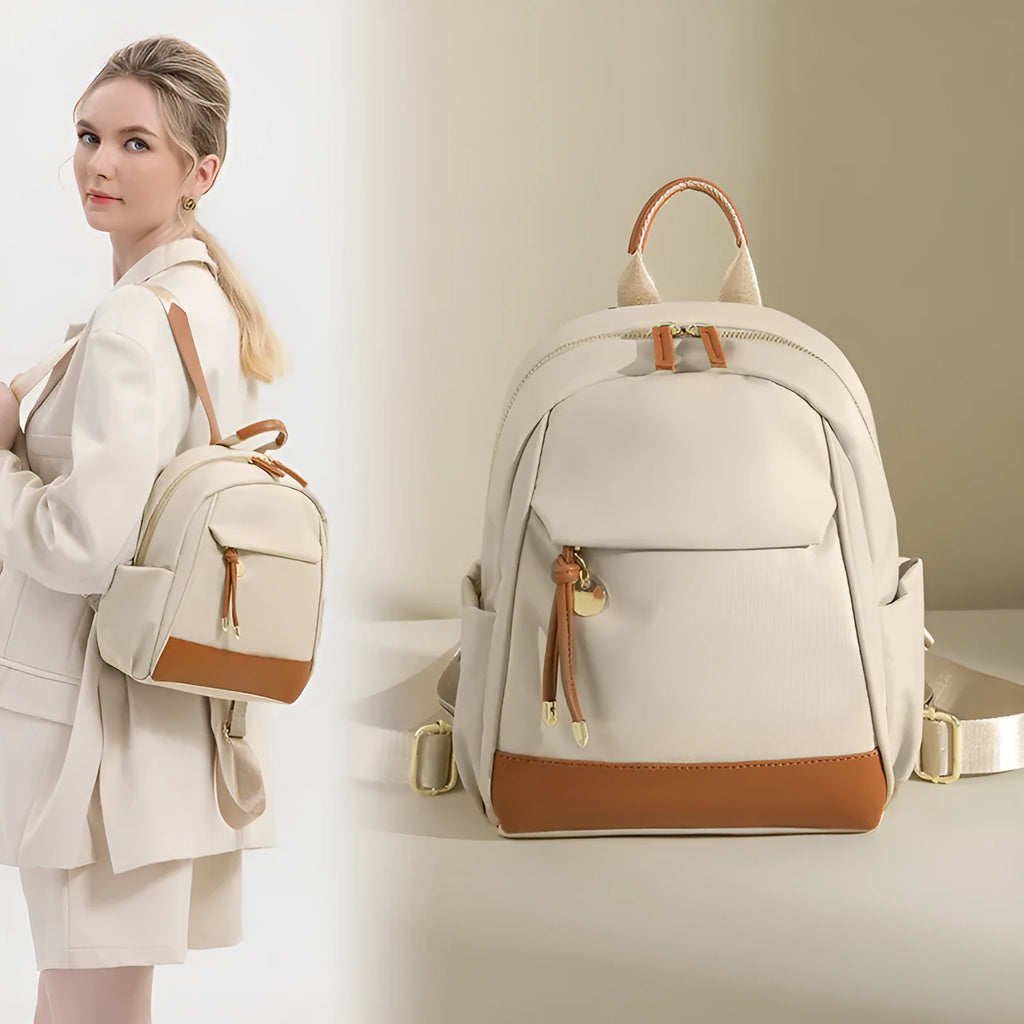 Women's double shoulder Oxford cloth backpack in almond colour with contrast stitching and open outer pocket