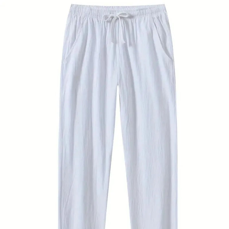 Men's cotton and linen beach pants in khaki, loose fit with drawstring waist, solid colour design