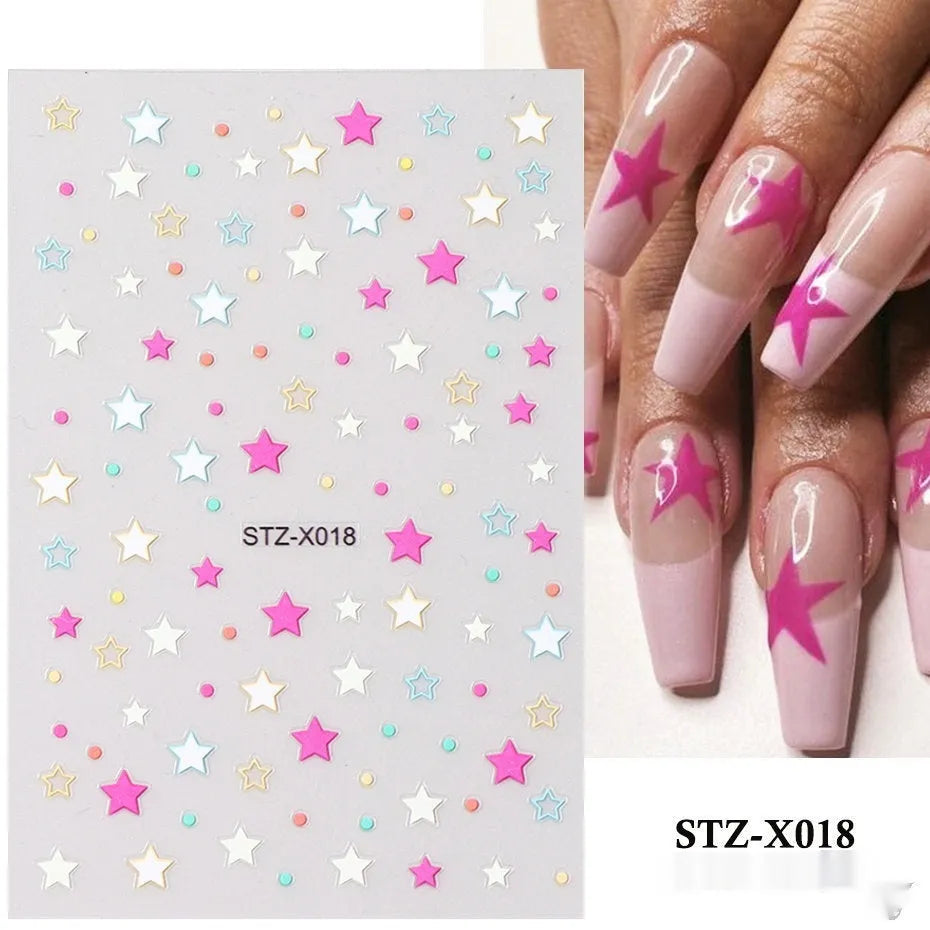 Sheet of black and silver strip nail art stickers with cartoon and love heart designs