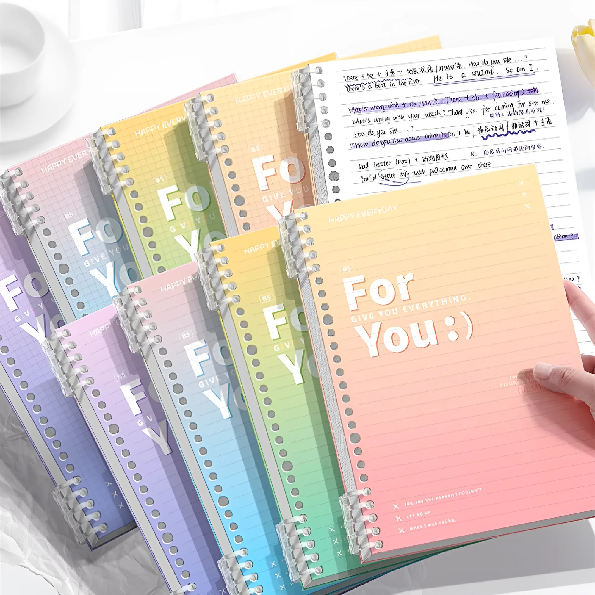 Gradient coloured removable coil notepad with PP cover in green, blue, pink, or purple.