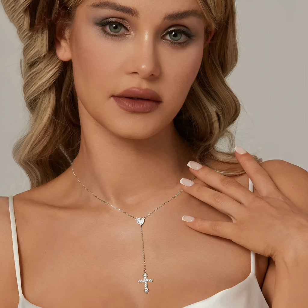 Simple silver cross necklace with V-neck pendant on O-ring chain in colour BSN384