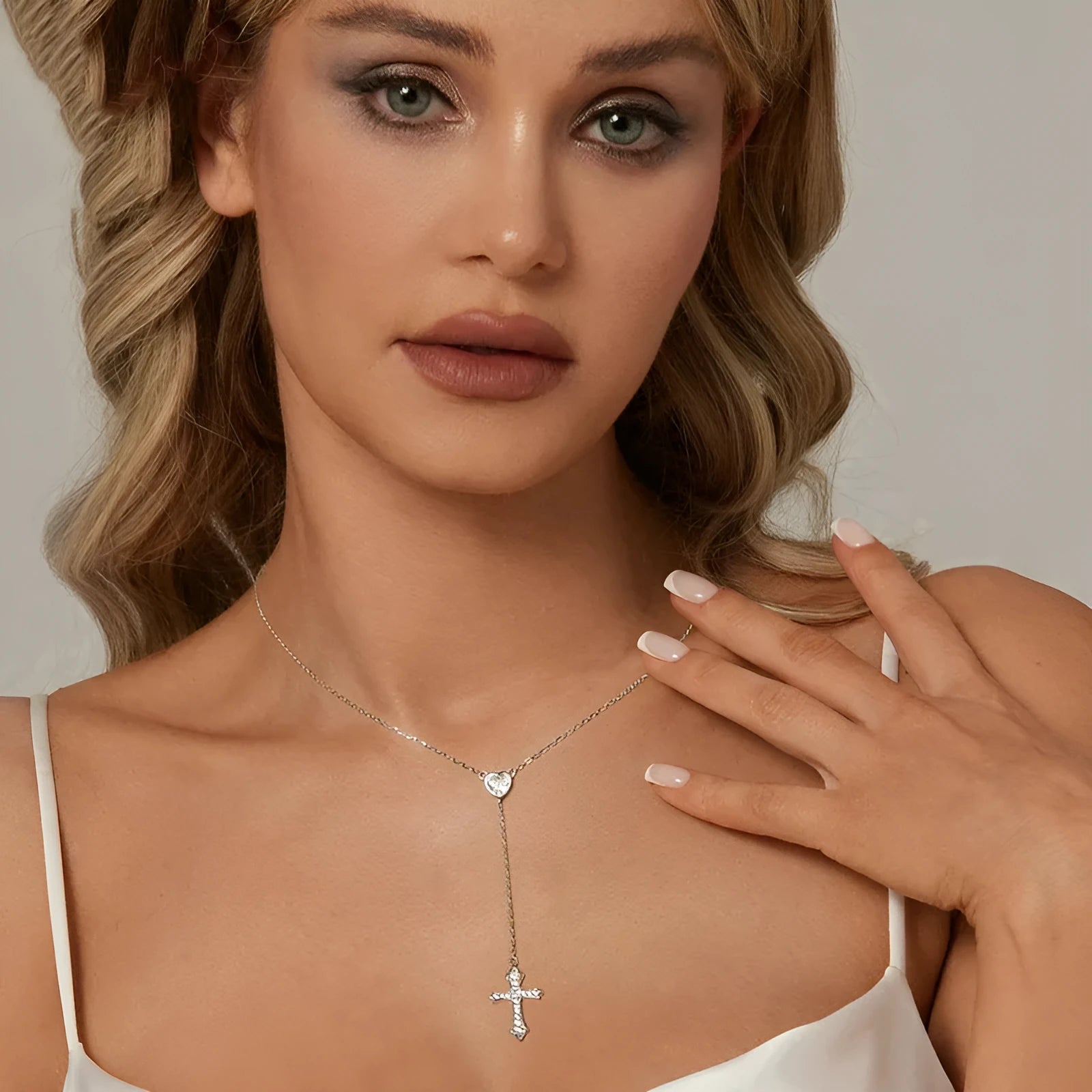 Simple silver cross necklace with V-neck pendant on O-ring chain in colour BSN384
