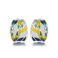 Pastoral style green mori enamel zircon ear clips with leaf motif, white gold colour on copper base