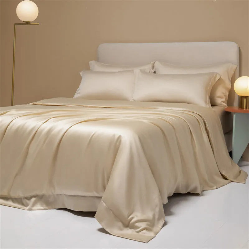 Luxury Lenzing Tencel quilt cover and pillowcase set in a modern style, showing colour options like Aurora Blue.