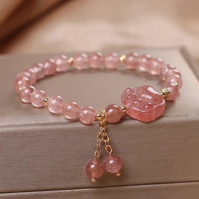 Double layer strawberry quartz bracelet with lucky cat charm and red cat's eye flowers