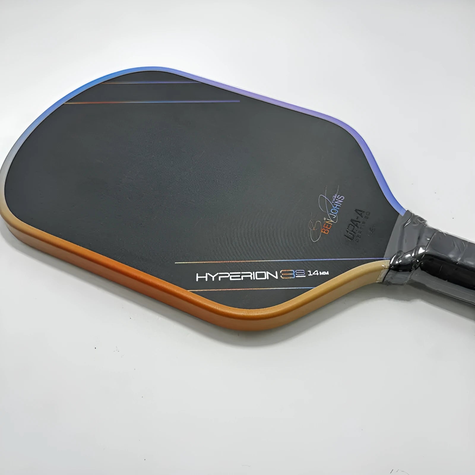 Pickleball paddle with carbon fibre matte surface showing cloth pattern texture