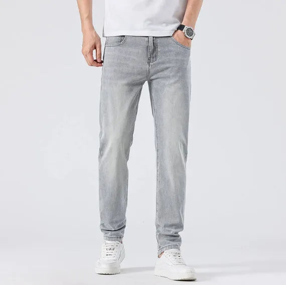 Men's light grey slim straight leg jeans with cotton no-iron finish, straight cut with small tube cuff