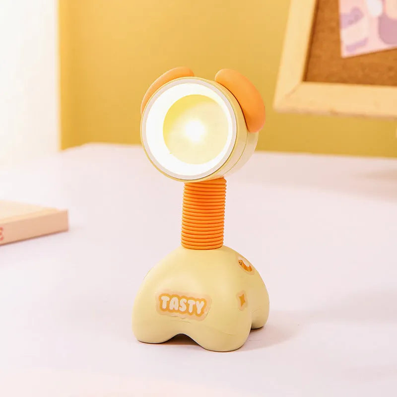 Cartoon animal magnetic night lamp with adjustable head on metallic surface