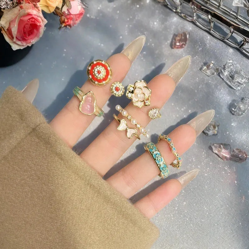 Adjustable gourd vintage ring with oil dripping finish in New Chinese style showing bow-shaped elements and zircon details