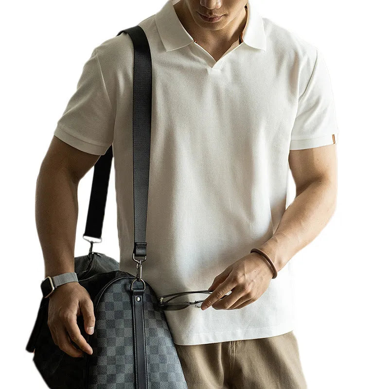 Blue American-style short-sleeved cotton blend polo shirt laid flat, showing regular fit and button placket.