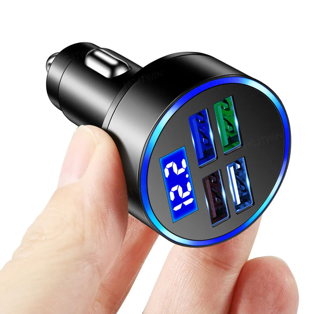 Black multi-port car charger with four USB ports and one cigarette lighter socket.