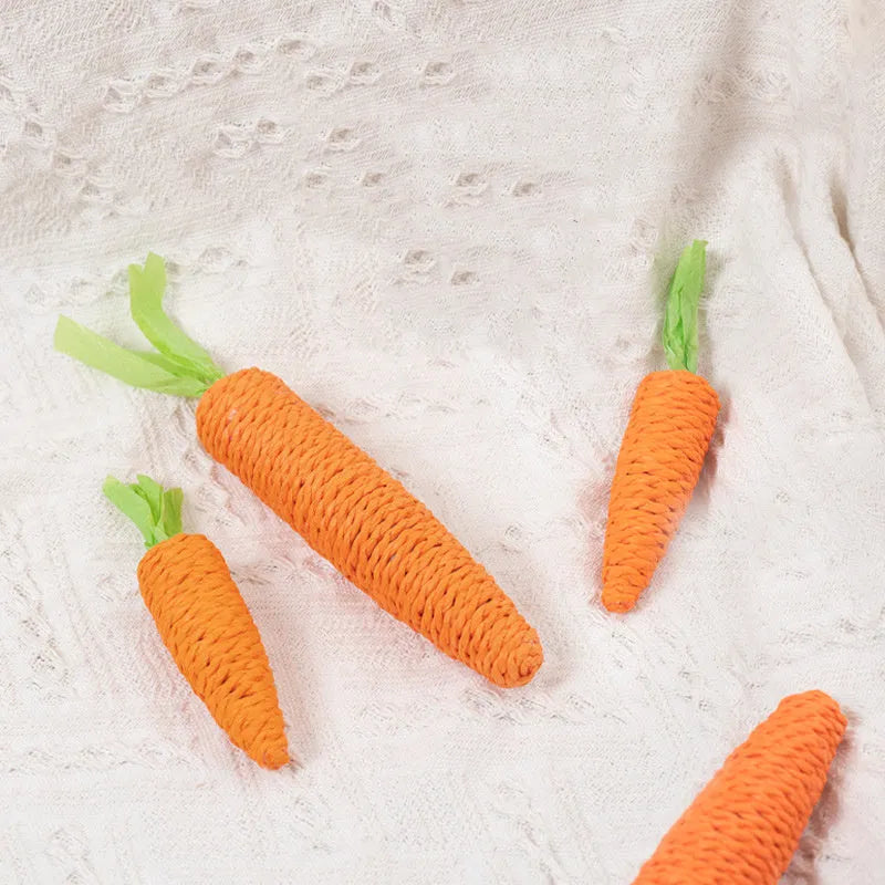 Assorted cat toys bundle showing carrot bites, ringing stones, sticks, and dental aids in two size options