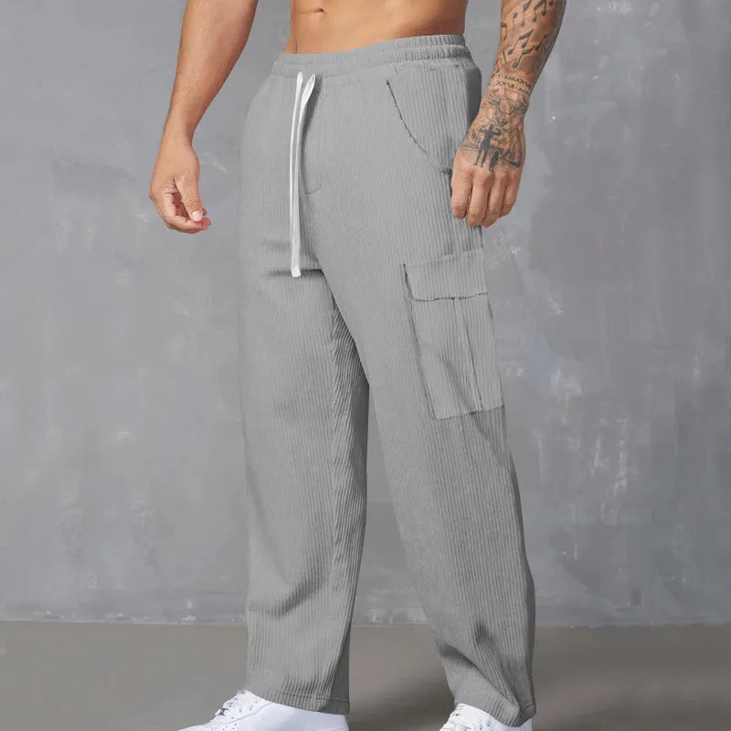 Men's corduroy cargo trousers in straight wide-leg design with drawstring waist