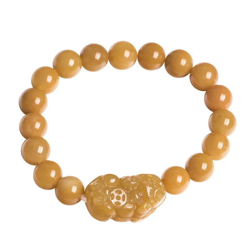 Carved Jinsi Jade money bracelet with Chinese characters on leather cord in gold thread colour