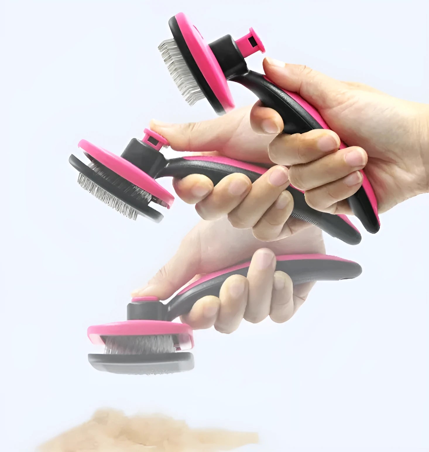 Automatic dehairing comb with stainless steel teeth and rose red handle, for dog and cat grooming, on a white background