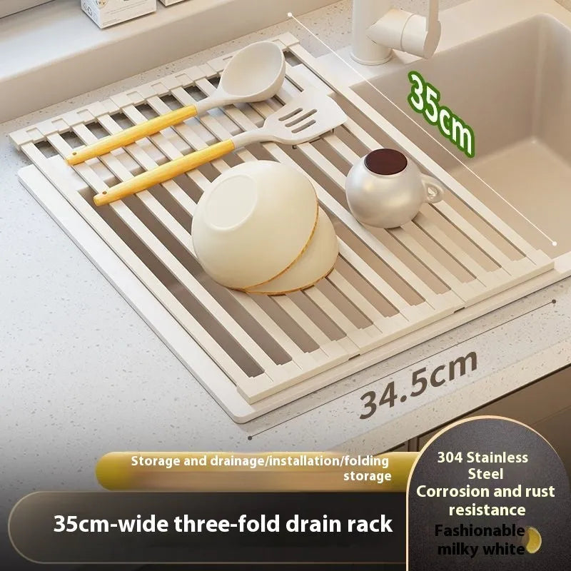 Milky white foldable stainless steel kitchen draining rack shown over a sink.