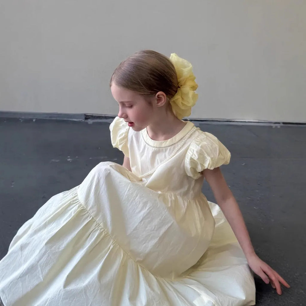Light yellow cotton princess dress with short puff sleeves and pearl chain for girls, summer style