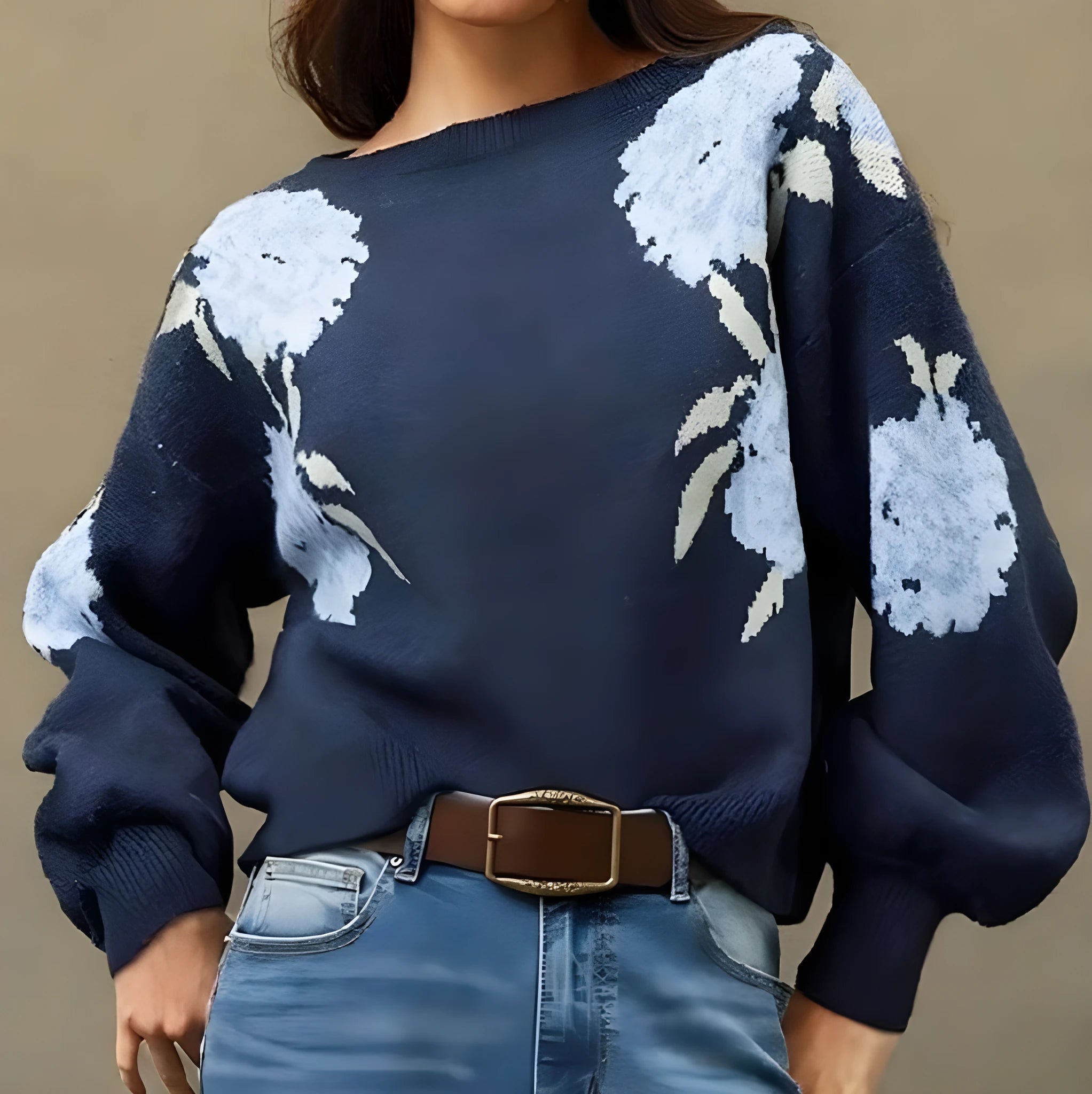 Sapphire blue women's loose pullover with a raised floral jacquard pattern and long sleeves.
