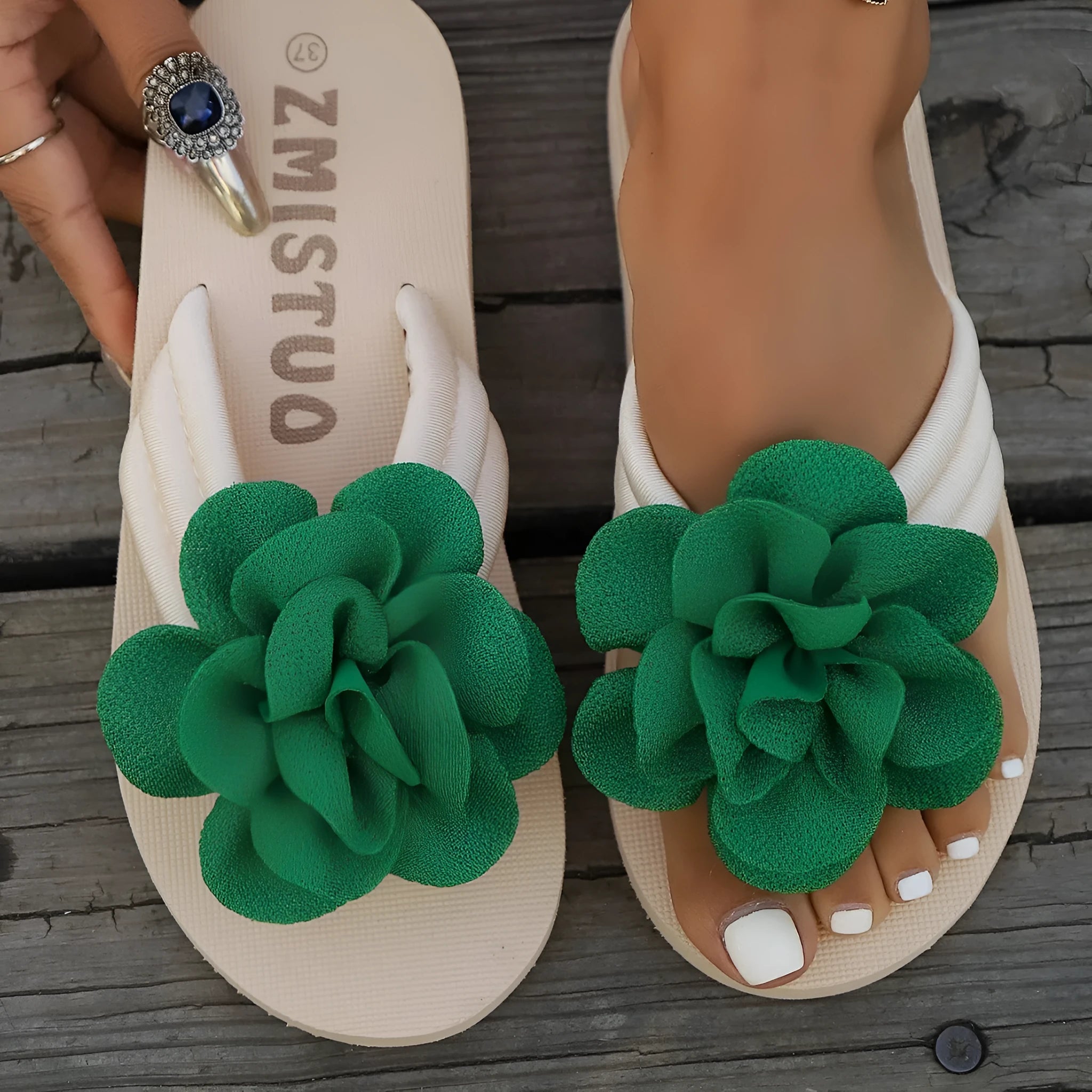 Women's floral print PU flip-flop slippers in green, available in sizes 36 to 43