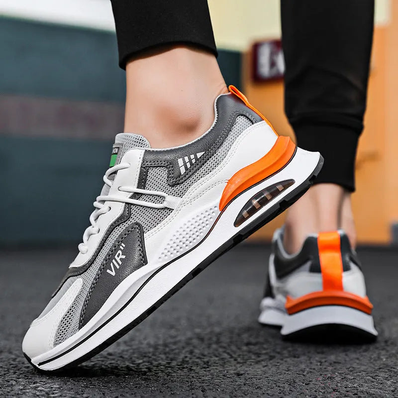 Men's grey breathable mesh running shoes with EVA sole and round toe design