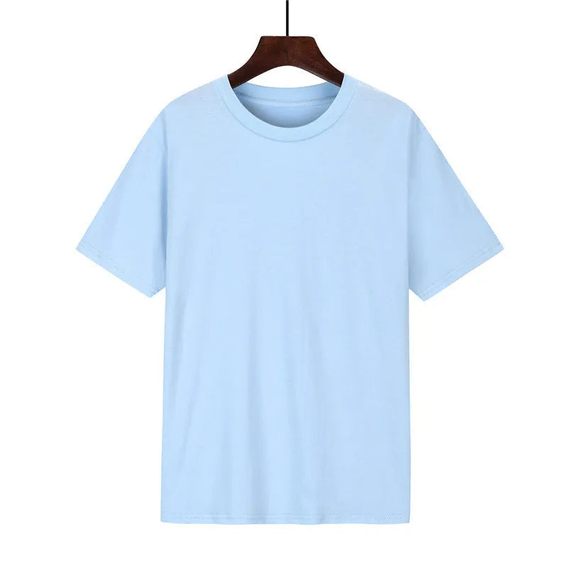 A man's loose-fitting black cotton t-shirt with short sleeves laid flat.