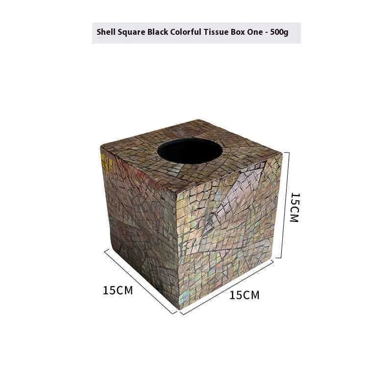 Modern black shell tissue box organiser with removable storage compartments on coffee table