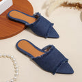 Women's flat denim slippers with a tassel detail and leather lining in apricot colour