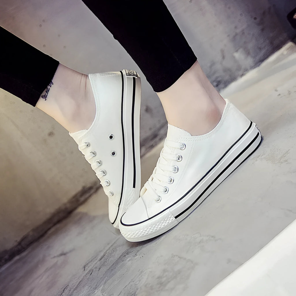 Women's casual canvas shoes in solid black, white-black, or white-red colour options