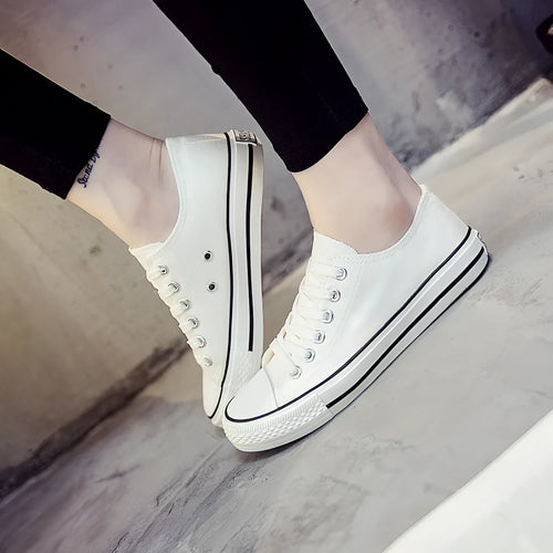 Women's casual canvas shoes in solid black, white-black, or white-red colour options