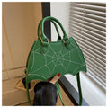 Women's small square PU saddle bag with spider web pattern, crossbody strap, and top handle, available in six colours including black and red