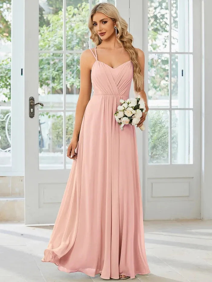 Women's long pleated A-line sleeveless dress in light green solid colour