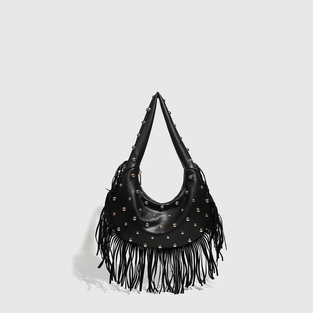 Retro black shoulder handbag with a tassel detail and an internal mobile phone pocket.