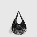 Retro black shoulder handbag with a tassel detail and an internal mobile phone pocket.
