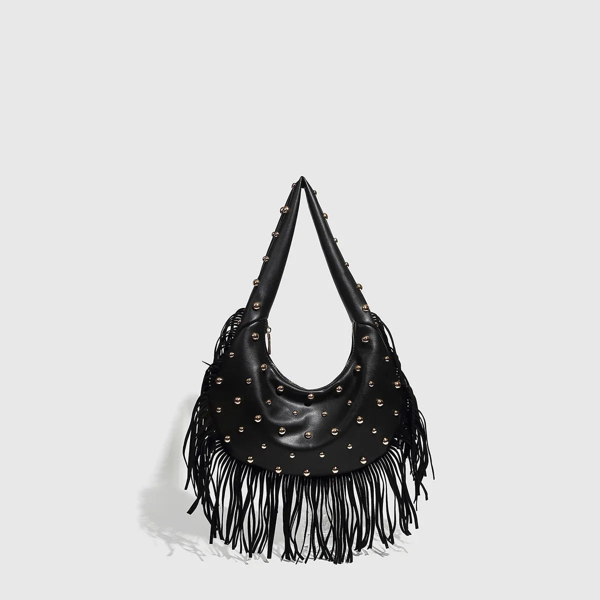 Retro black shoulder handbag with a tassel detail and an internal mobile phone pocket.