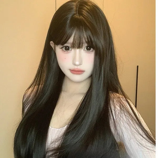 Dark brown long straight women's wig with bangs on wig head