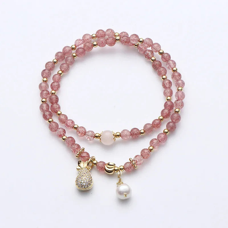 Women's geometric strawberry quartz crystal bracelet with adjustable fitting for money drawing