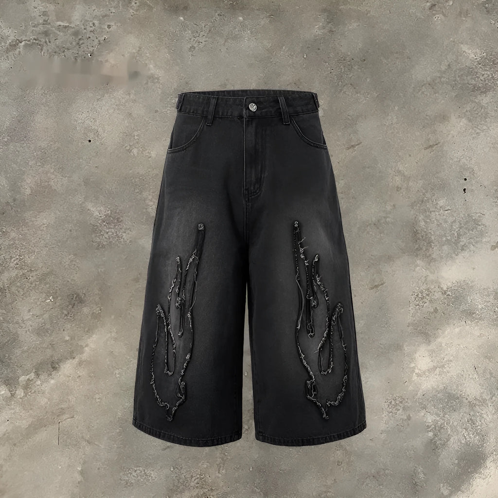 Men's black denim shorts with flame embroidery and patch detailing in straight cut design