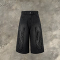 Men's black denim shorts with flame embroidery and patch detailing in straight cut design