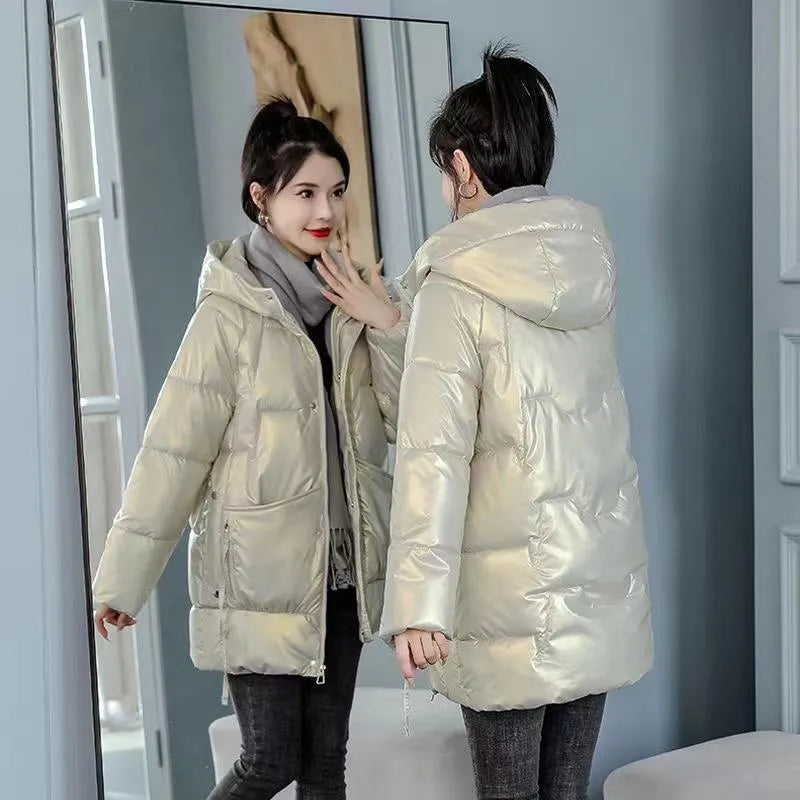 Women's loose thick winter hooded jacket in black colour with long sleeves
