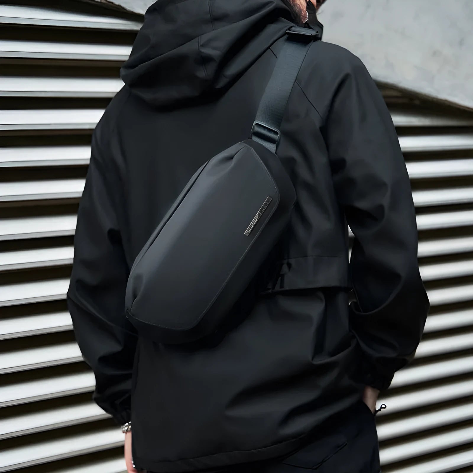 Black Oxford cloth mens messenger bag with cross-body strap and street trend styling