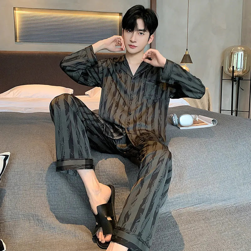 Men's black striped Ice silk long sleeve V-neck pajama set with trousers.