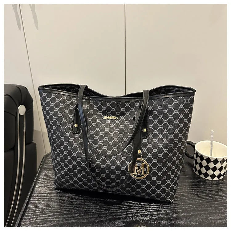 Black PU leather street-style shoulder bag with sewing thread detail, shown next to grey, brown, and white colour options.