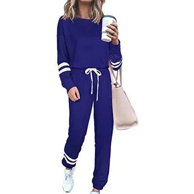 Women's plus size casual two-piece suit set in a solid colour, showing loose-fitting long sleeve top and trousers.