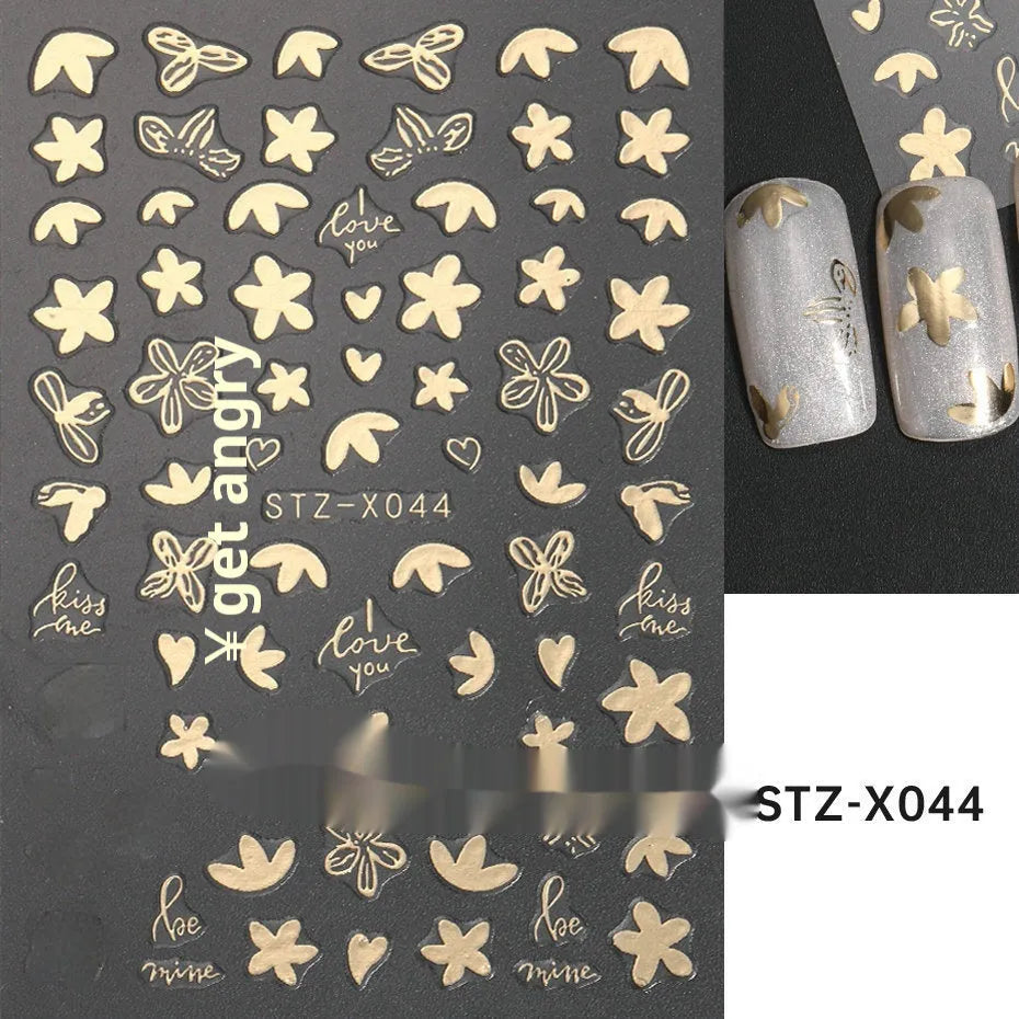 Sheet of black and silver strip nail art stickers with cartoon and love heart designs