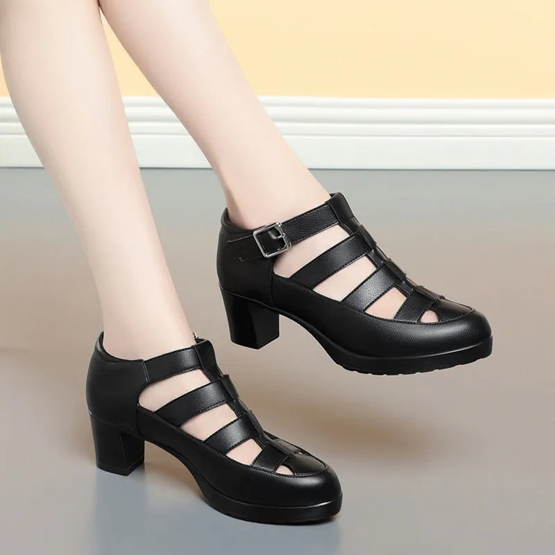 Women's beige closed toe sandals with chunky heel, ankle strap, buckle, and back zipper.